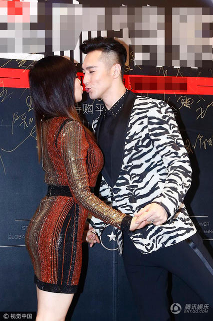 钟丽缇携嫩夫又亲又抱 张伦硕现场飙车推到钟丽缇